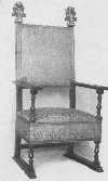 This chair with its silk damask covering edged with gimp,
the shape of the underframing and arms, and the dull gold carved
ornaments, shows many characteristics of the Italian Renaissance.