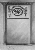 This style of mirror was popular in the early nineteenth
century.