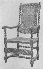This reproduction of a Charles II chair shows cherubs
supporting crowns.
