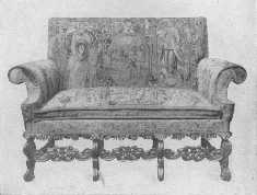 Original Jacobean settle with tapestry covering. These
 pieces of furniture range in price between $900 and $1,400.