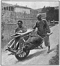 FIG. 92.&mdash;The wheelbarrow lightens labor.