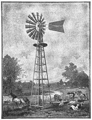 FIG. 119.&mdash;The windmill pumps water into the troughs
where cattle drink.