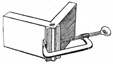 Fig. 116.&mdash;Cramping a Tongued and Grooved Mitre.