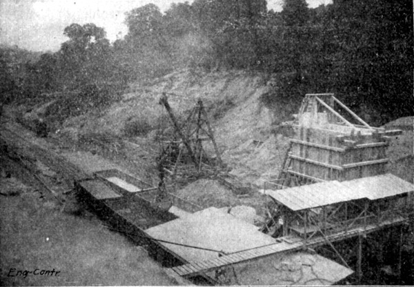 Fig. 140.&mdash;View of Mixer Plant Showing Method of
Unloading Materials, Burton Tunnel.