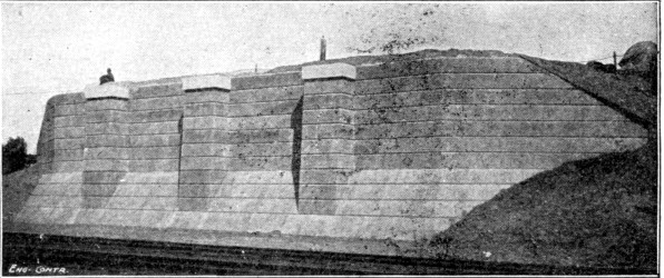 Fig. 48.&mdash;Concrete Abutment with Scrubbed Finish and
Course Marks.