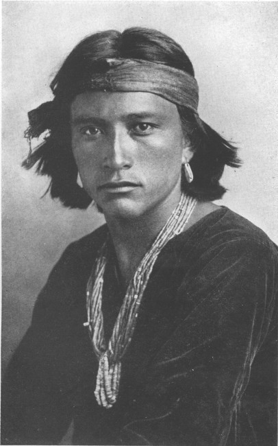 A Navajo boy who is exceptionally handsome and
picturesque
