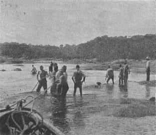 EN ROUTE TO THE GOLDFIELDS OF GUIANA. PASSING THE RAPIDS
OF THE ESSEQUEBO.