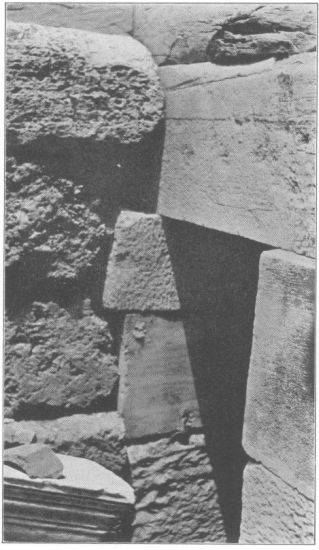Figure 6

View of N. end of W. interior foundation showing that it does not key
into the foundation of the N. wall