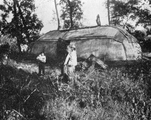 b. Long structure with entrance on one side

WINNEBAGO HABITATIONS, ABOUT 1870