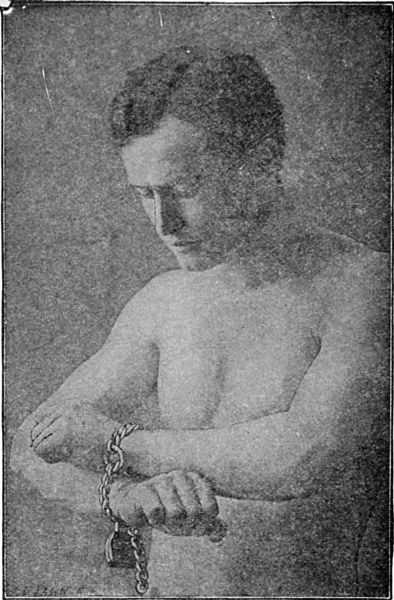 Houdini, as Chained and Handcuffed Before the Judges in
the First Trial of His Action Against the Royal Police of Cologne.