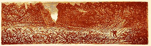 man hiking by craggy mountains