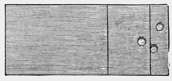 oblong
board with three holes in the right side