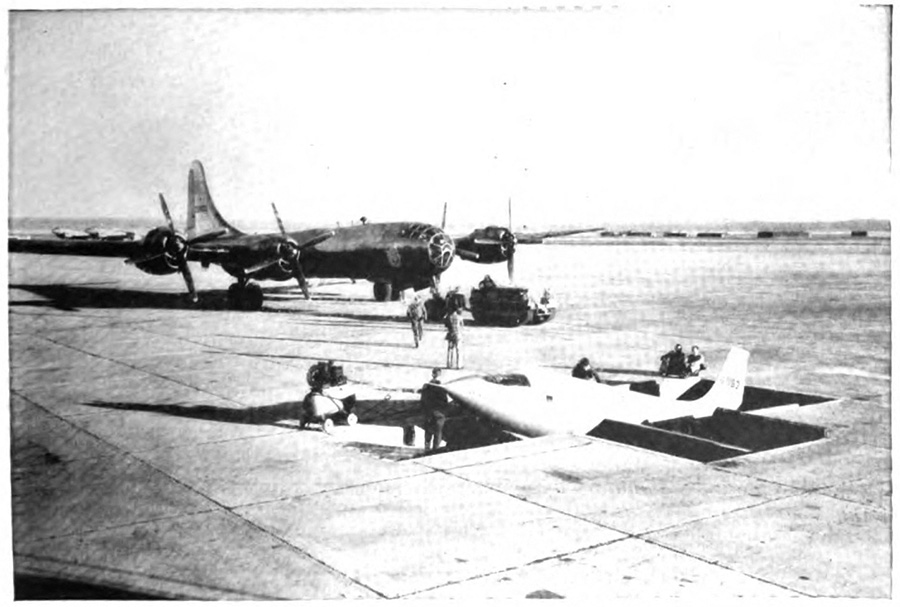 Crew working with two airplanes