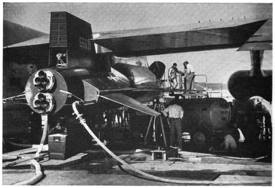 Men standing near an airplane